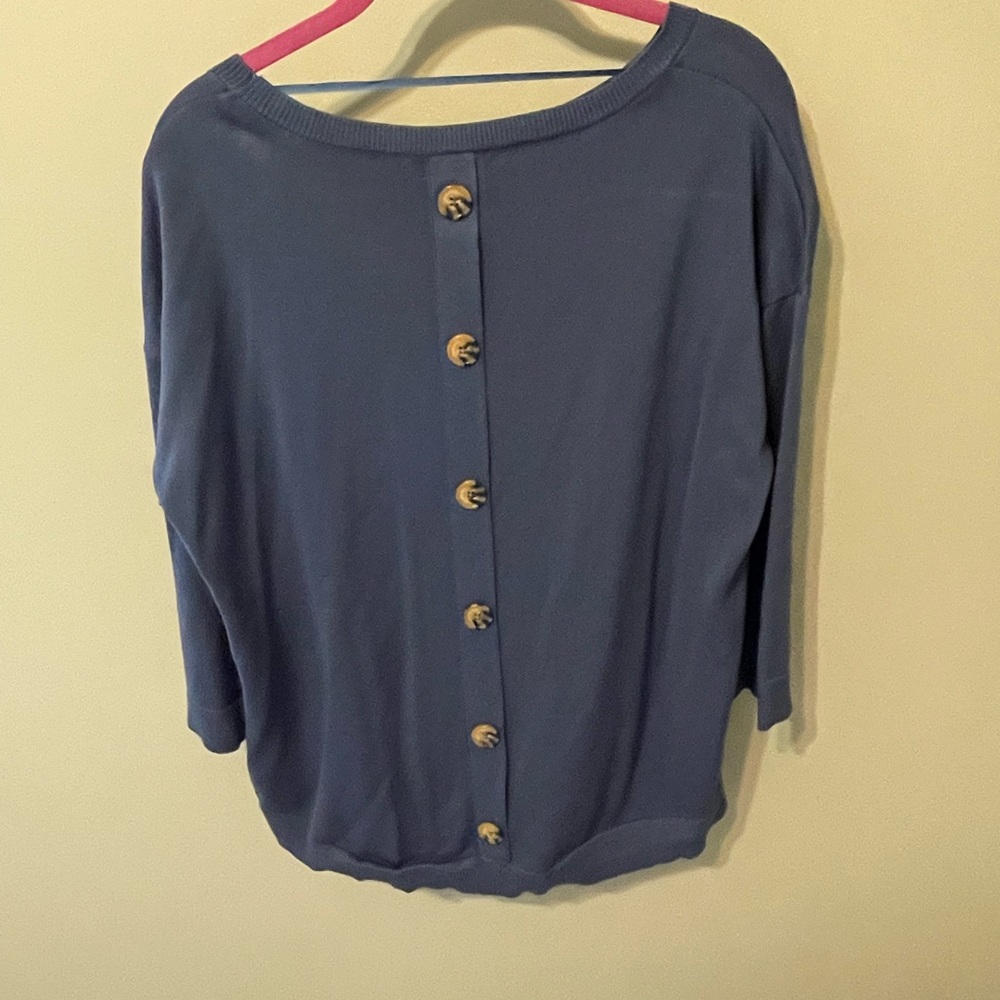 Blue sweater with buttons on back